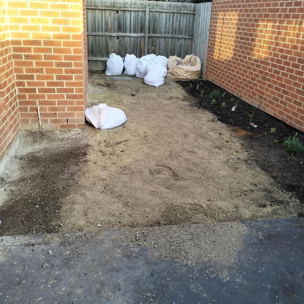 Manual sifting of sand from gravel.jpg