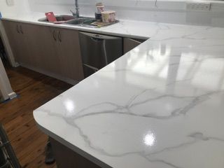 Finished bench & tiles, orig cupboards under sink