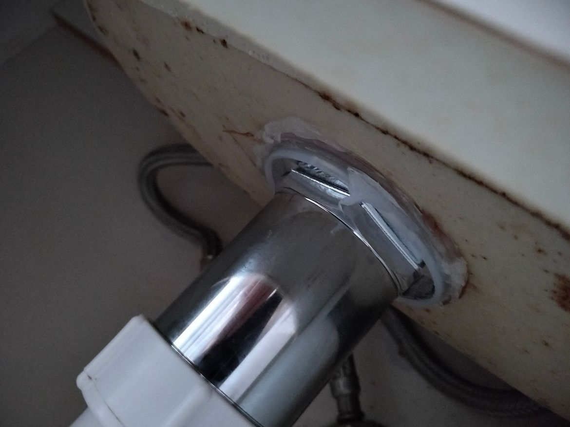 plastic nut under basin sink.jpg