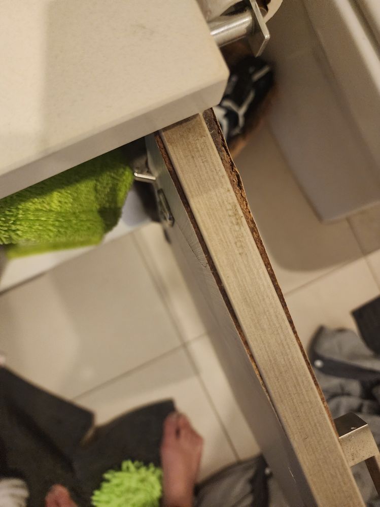 This vanity has Four doors and one has this damage. Im thinking of selling my place so looking for an easy, cheap but effective repair option. Any ideas are welcome!