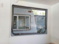 Then re-attach the magnetic insect screen.