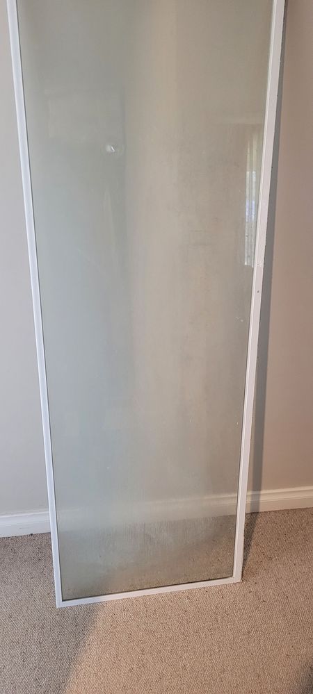 Photo of detached shower screen