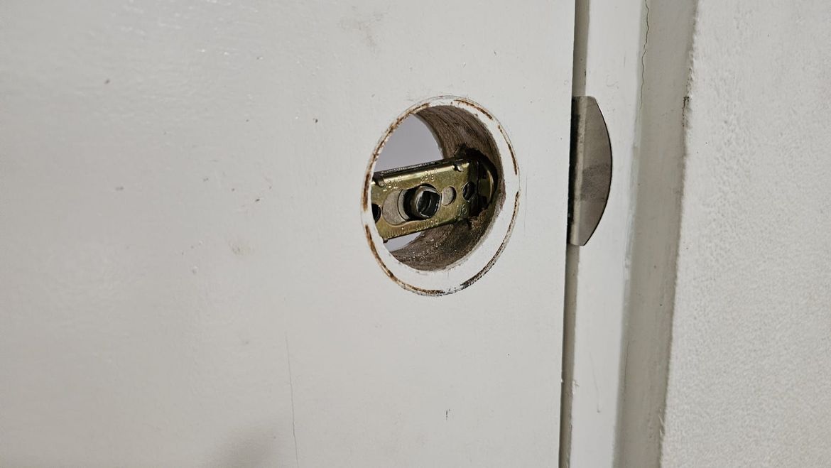 Stuck latch, the handle no longer able to turn and open the door.