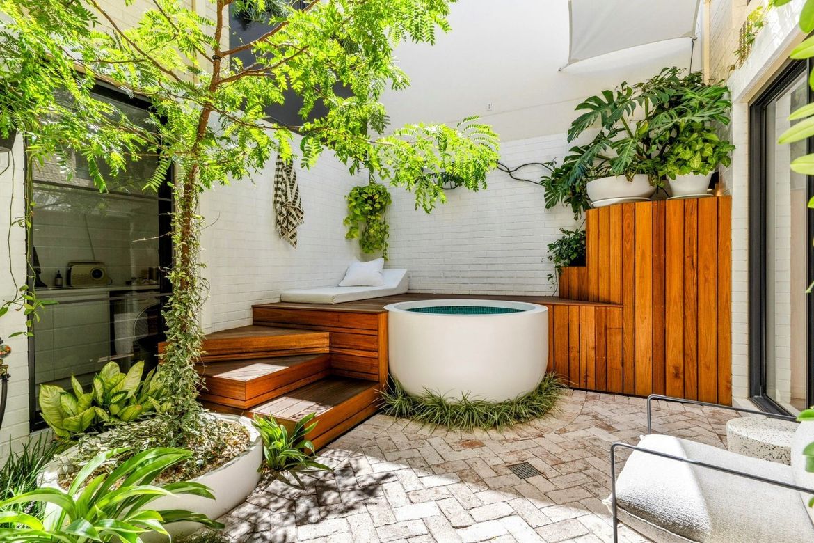 Courtyard makeover with planter pot plunge pool.jpg