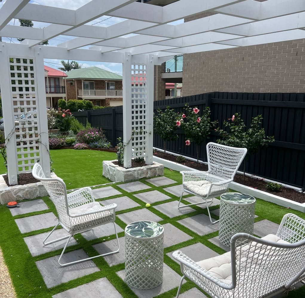 Front yard makeover with arbour and paving.jpeg