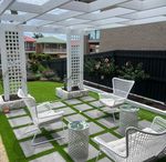 Front yard makeover with arbour and paving.jpeg