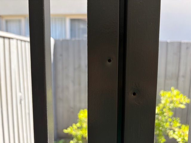 Rivet holes where previous screen was installed