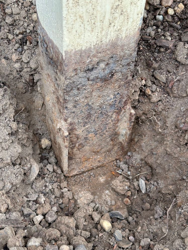 Rusted post and anchor