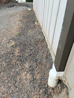 garage is higher position - slope in garden.jpeg