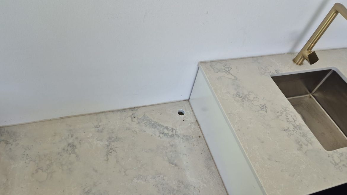 Image D - hole in stone bench where gas extension cable can go?