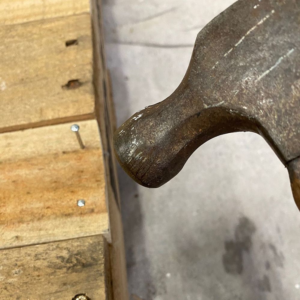 4.2 Fix strips in place with nails.jpg