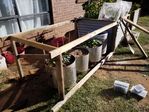 Made a basic frame off the side of an existing raised bed.