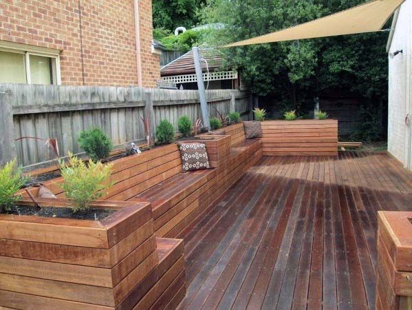 backyard-ideas-deck-bench-wood-with-planters.jpg