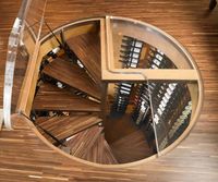 Spiral-staicase-leading-into-a-wine-cellar-that-saves-up-on-space.jpg
