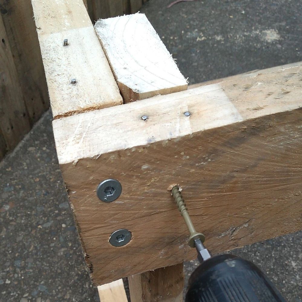 3.3 Additional screws from outside being added.jpg