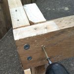 3.3 Additional screws from outside being added.jpg