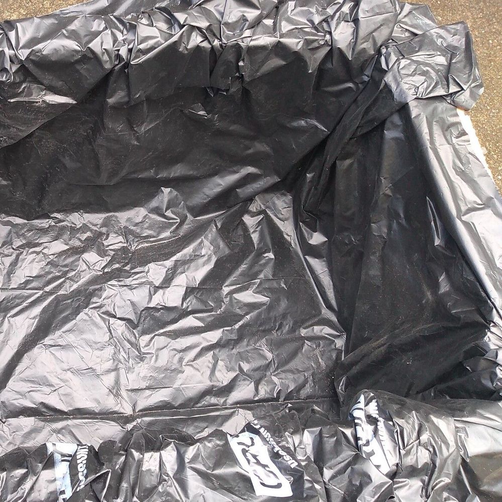 7.1 Builders plastic laid in planter.jpg