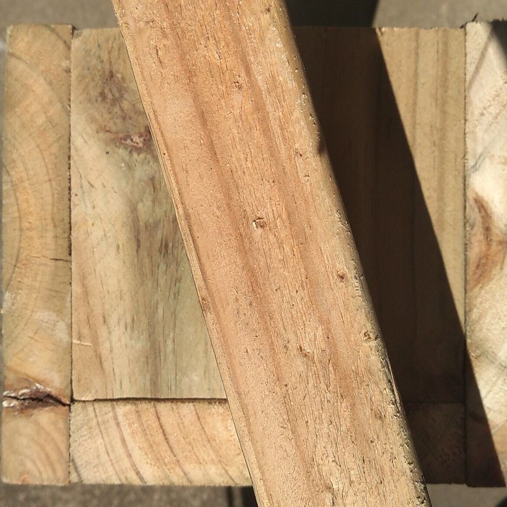 6.2 Take an offcut and diagonally position it on central line.jpg