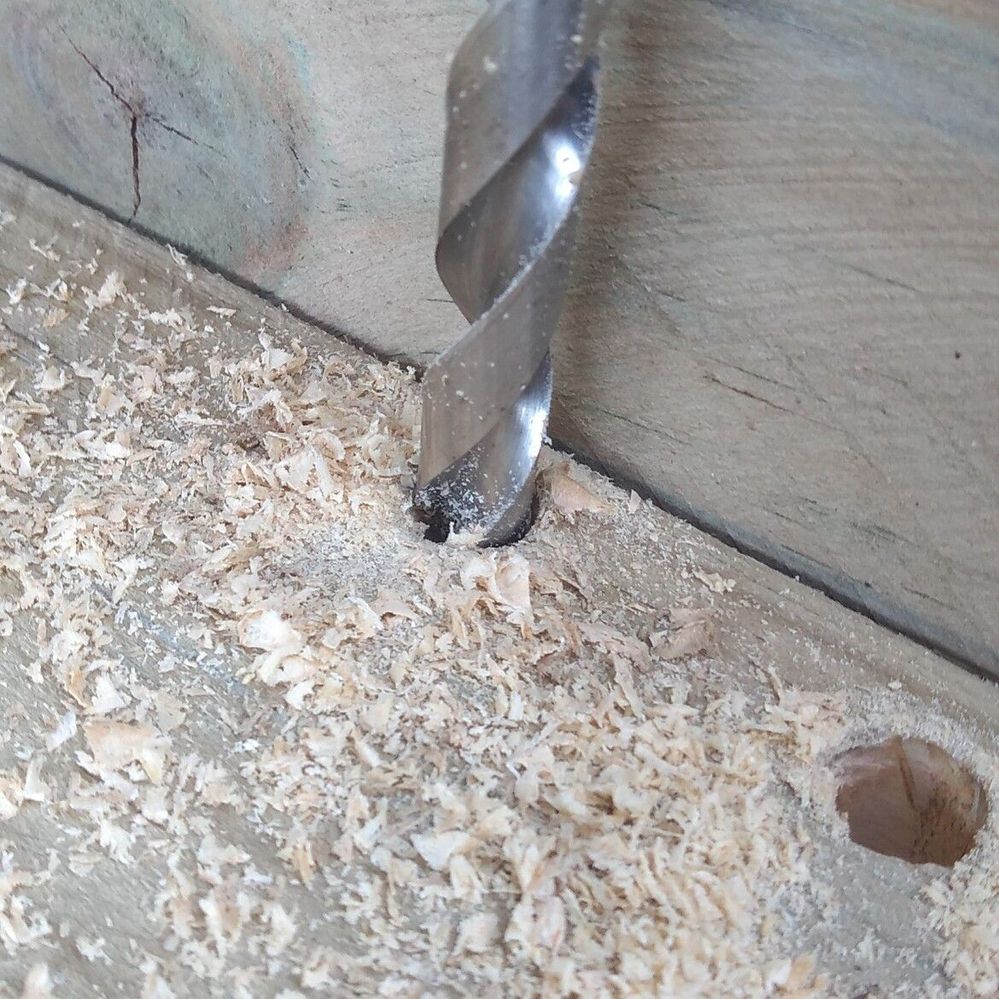 8.1 Drill holes in base of planter for drainage.jpg