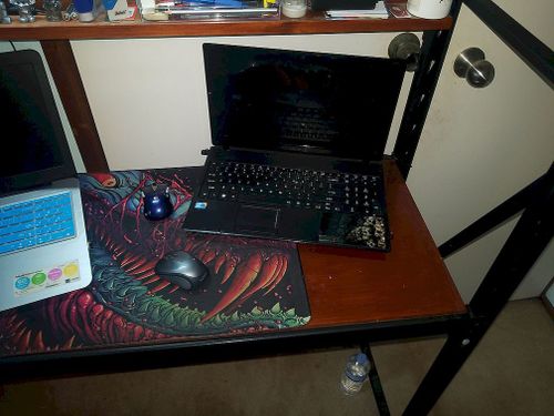 i stained the shelf 5 times on both sides. I still use a large mouse pad.