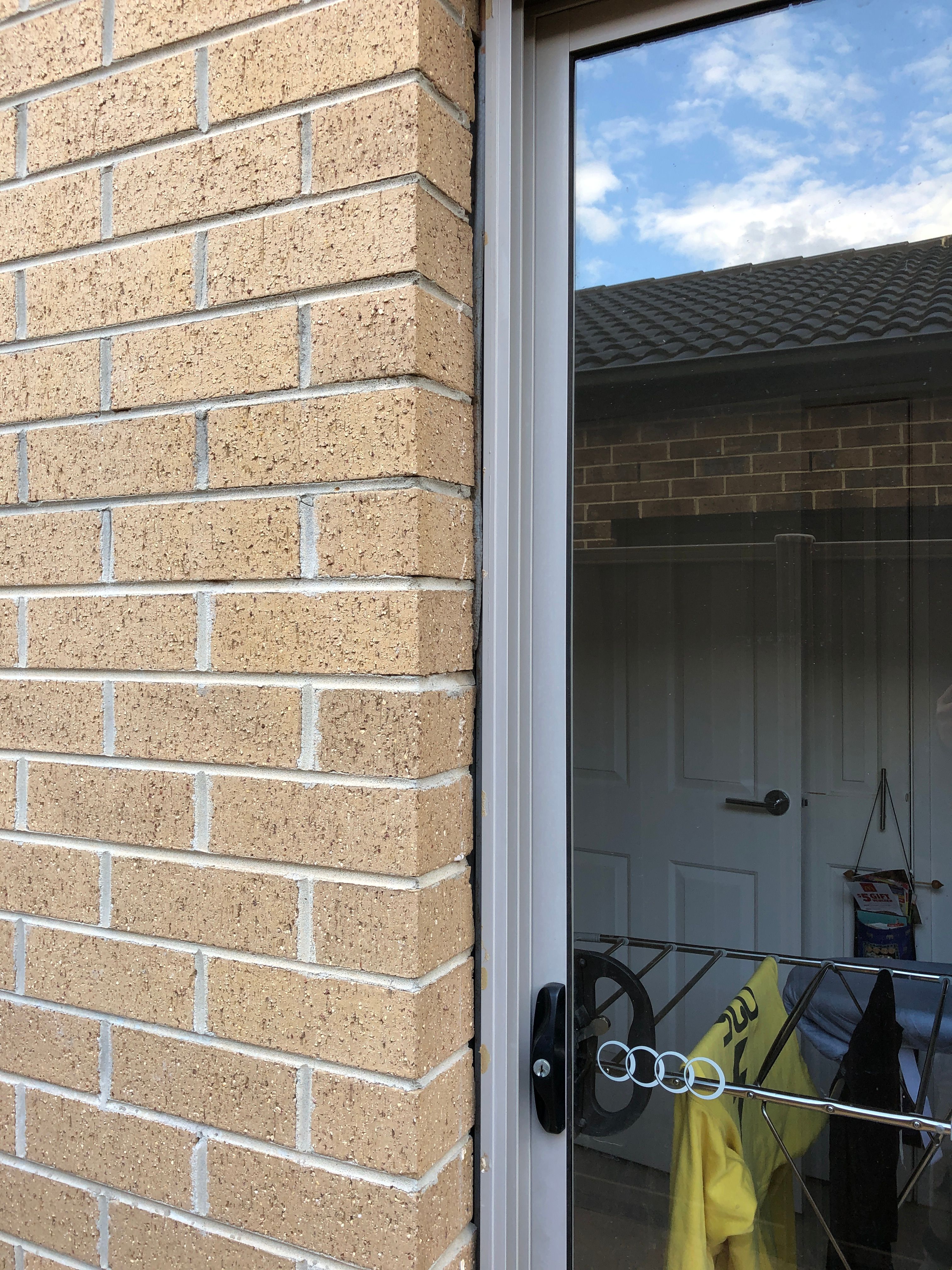External gap between brick and sliding d... Bunnings community