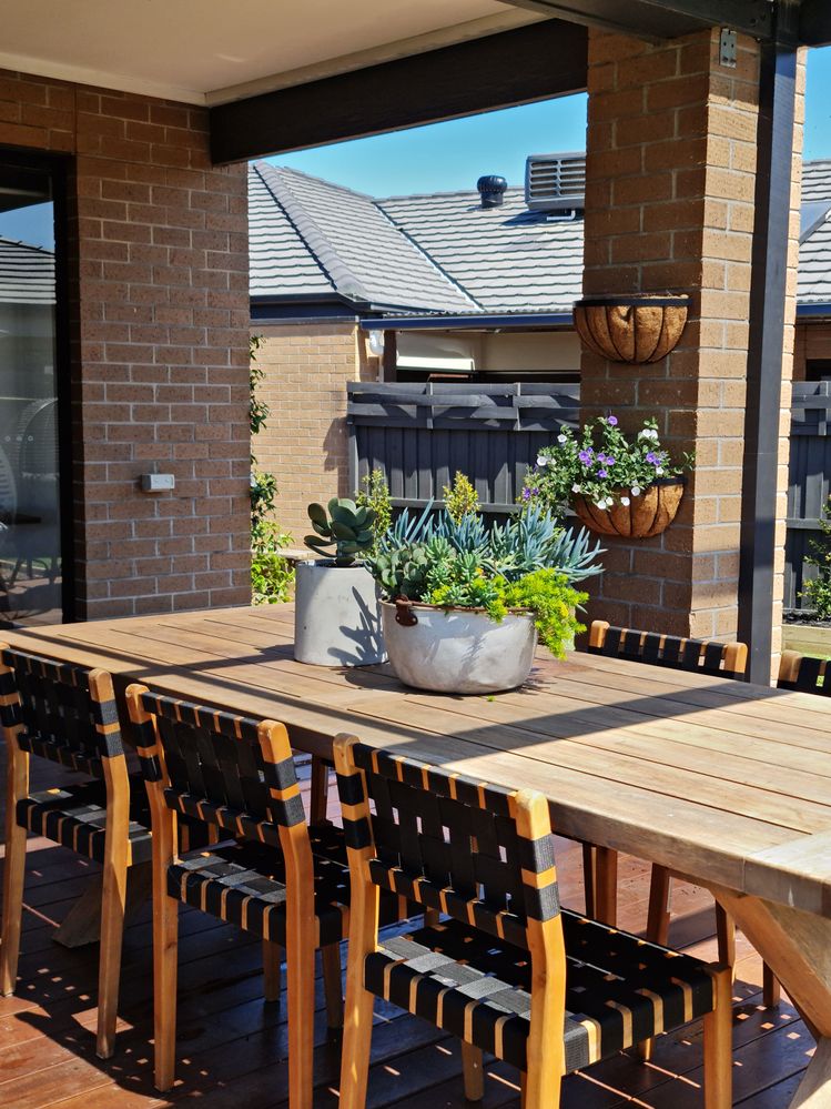 I love Succulents! Table from Bunnings, Chairs from Kmart! This pot was used 40 years ago at my Nanas Pub!