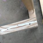 5.3 Applying glue to shelves.jpg