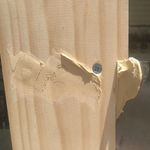 6.1 Filling screw holes with putty.jpg