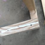 5.3 Applying glue to shelves.jpg