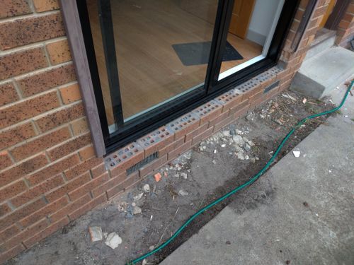 Newly installed sliding door, deck will butt up to door