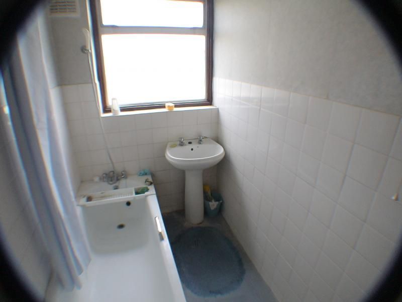 old bathroom, toilet on otherside of wall.jpg