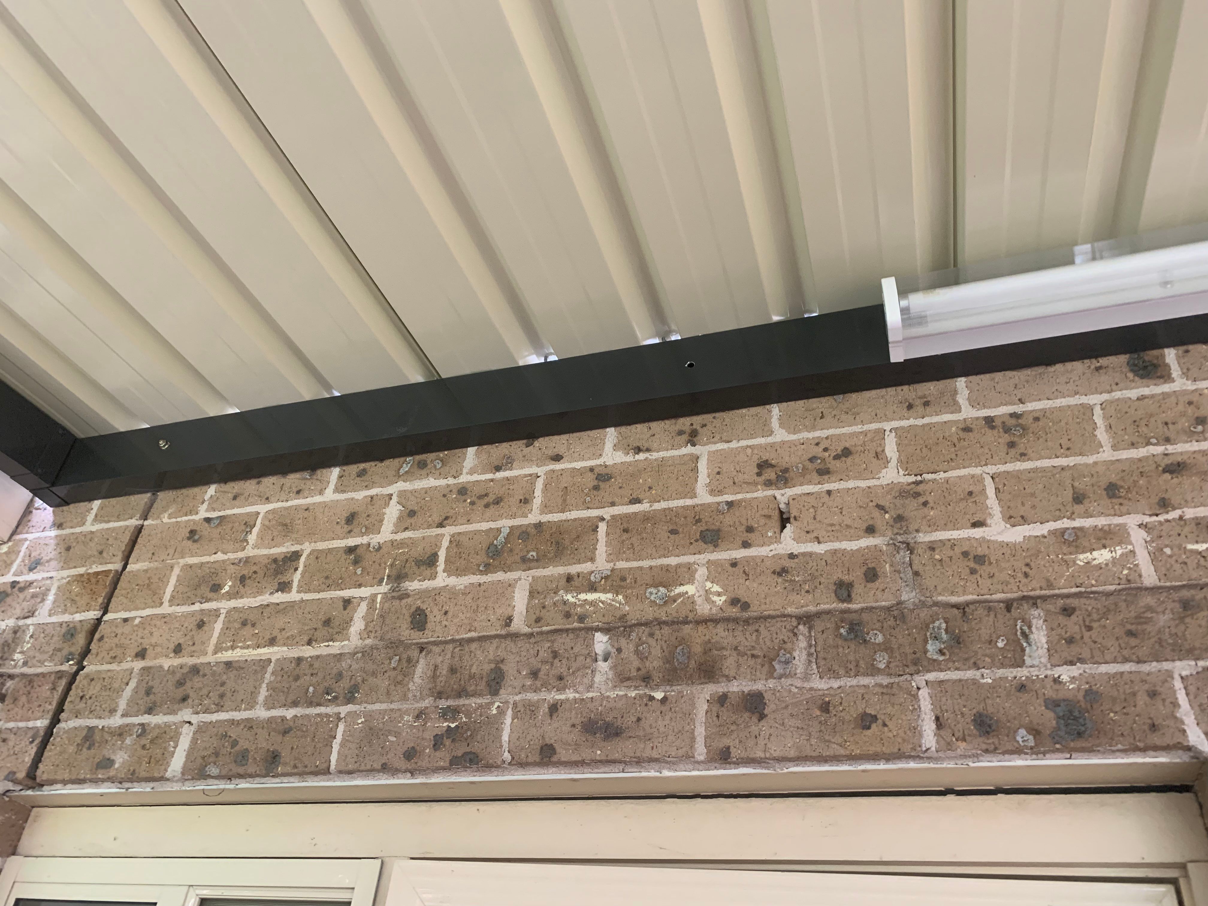 Attaching metal post to brick wall Bunnings community