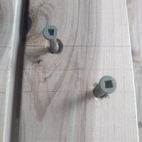 5.2 Installing screws through slats into side panels.jpg