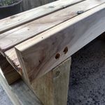 5.5 Screwing top slat into side panels.jpg