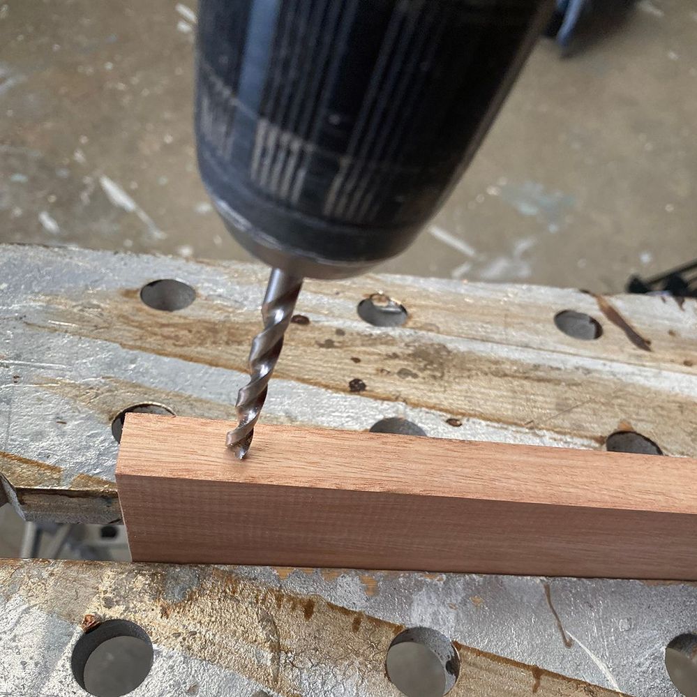 2.1 Drill into the sides and central divider.jpg