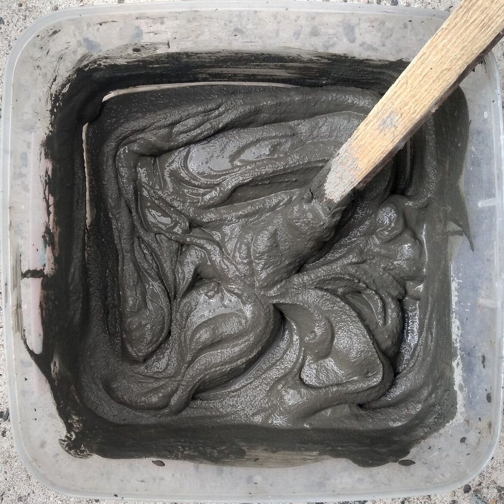 1.5 Stirring the mix until a runny consistency is achieved.jpg