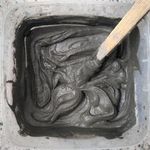 1.5 Stirring the mix until a runny consistency is achieved.jpg