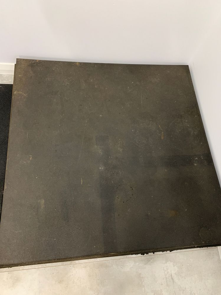 How do I clean rubber gym flooring?