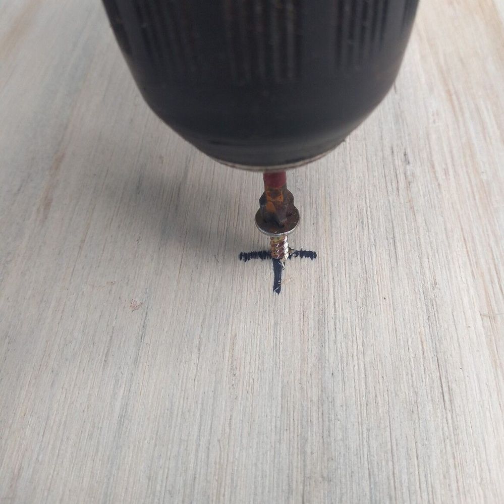 1.3 Adding screw to centre mark.jpg