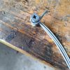9.2 Hanging wire wrapped around screw.jpg