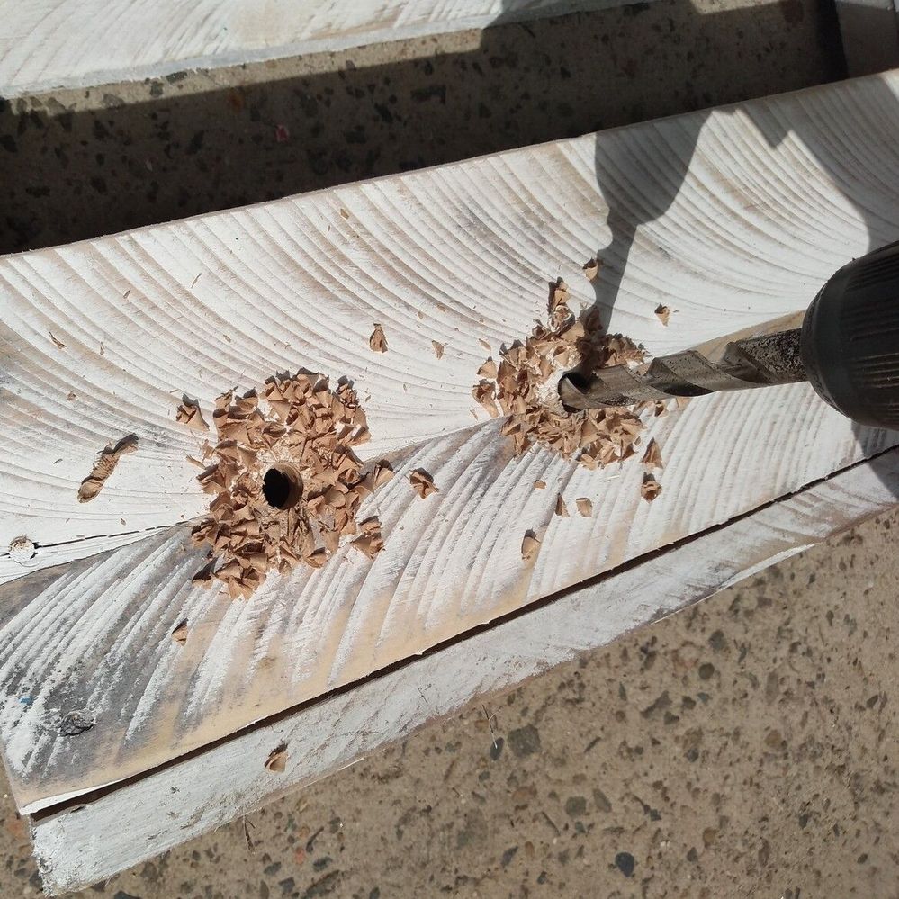 6.1 Drilling holes for string..jpg