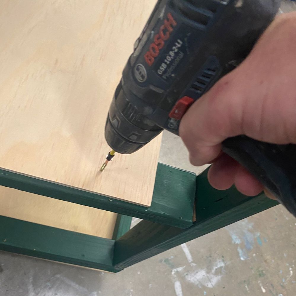 Step 7.5 Screw in shelves.jpg