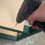 Step 7.5 Screw in shelves.jpg