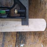 2.3 Marking hole location on hangers.jpeg