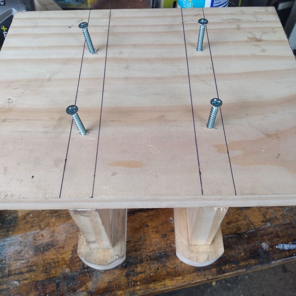 4.7 Fixing screws through horizontal joiner into dividers.jpeg