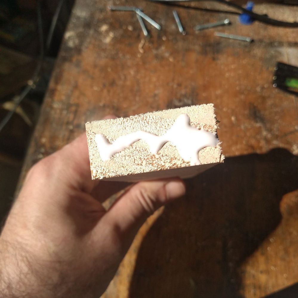 6.4 Applying glue to trim piece.jpeg