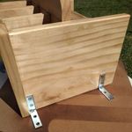 10.2 Attaching mounting brackets to charging station.jpeg