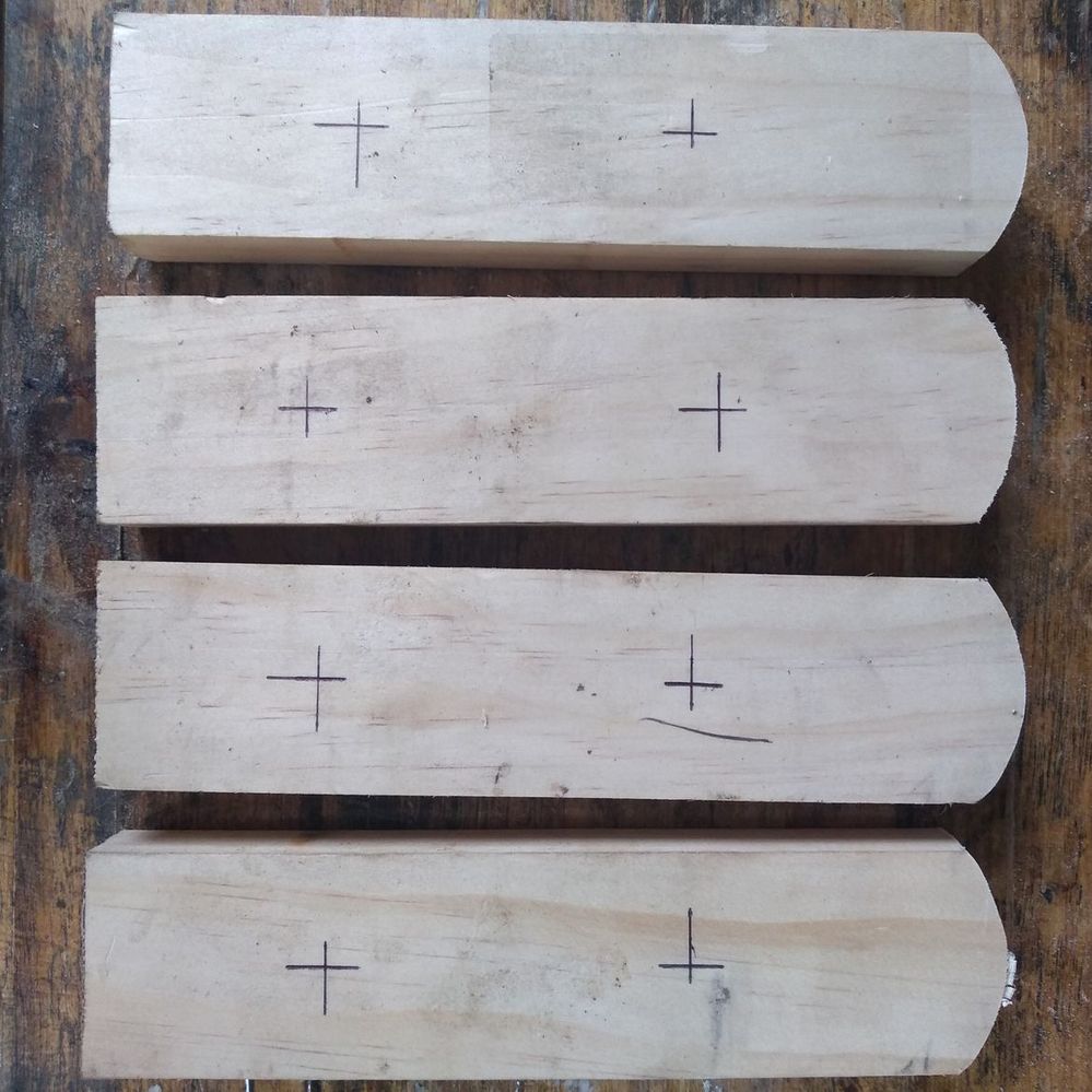 2.4 Hole locations on hangers marked.jpeg