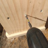 5.9 Fixing screws through side piece into horizontal joiner.jpeg
