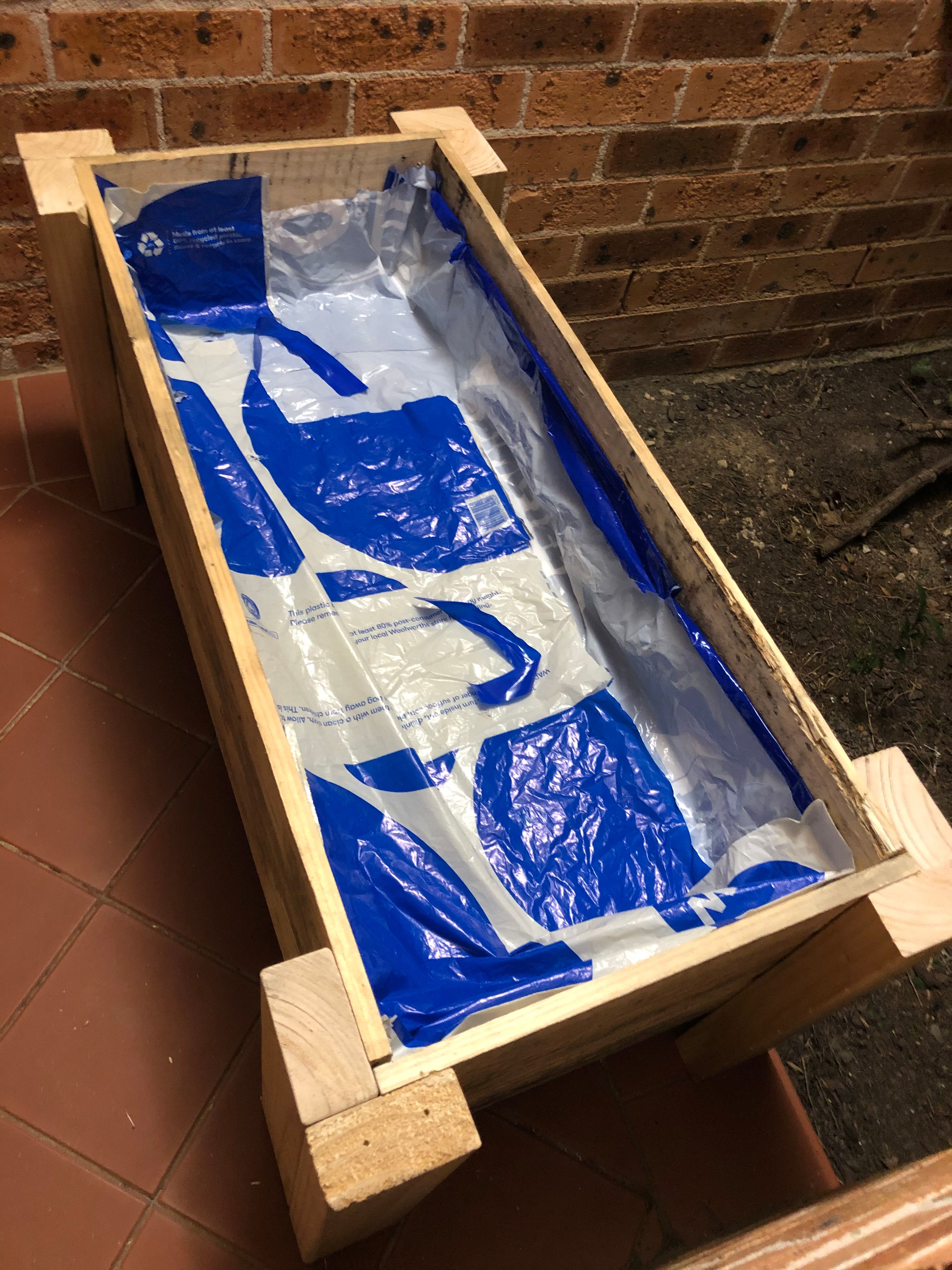 Elevated planter box using pallet timber Bunnings community